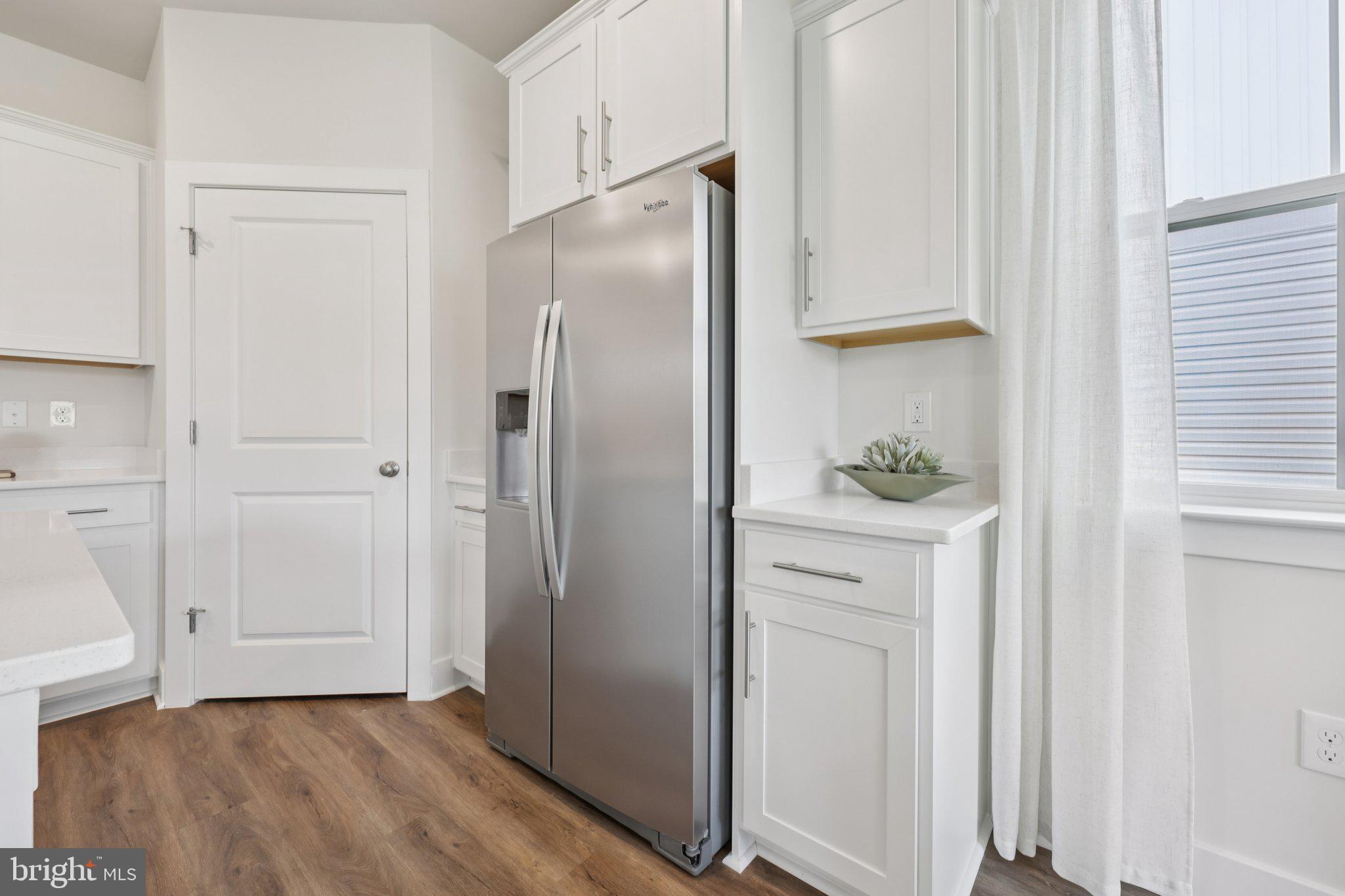 110 Trellis View Lane Winchester, VA 22602 - Photo 14 of 45 a view of cabinets and wooden floor
