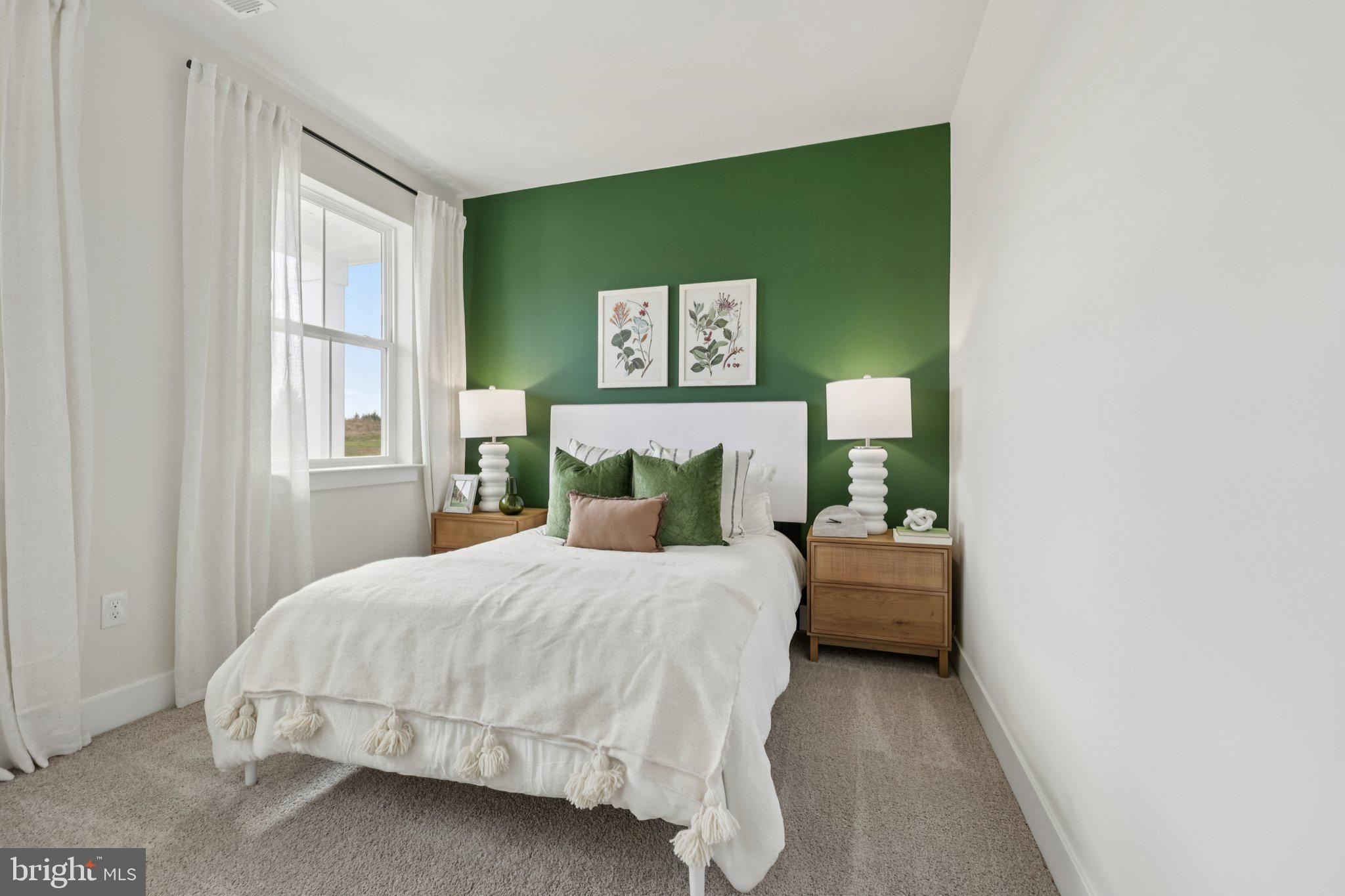 110 Trellis View Lane Winchester, VA 22602 - Photo 17 of 45 a bedroom with a bed and window