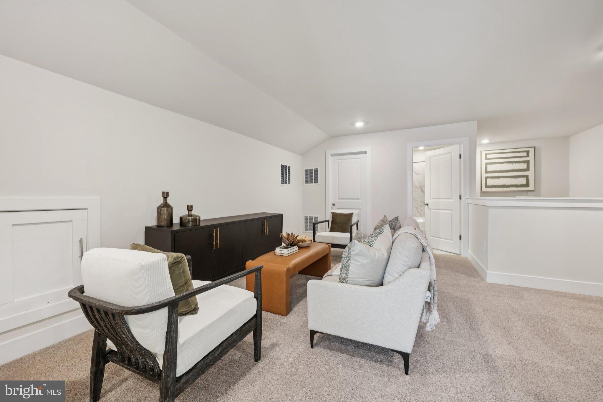 110 Trellis View Lane Winchester, VA 22602 - Photo 28 of 45 a living room with furniture and a wooden floor