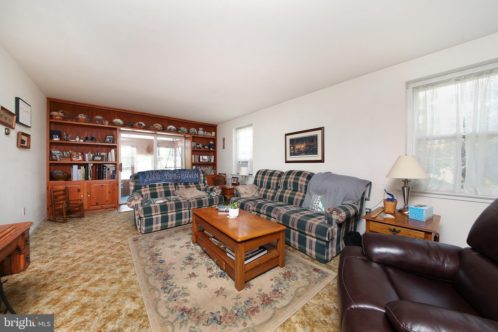 618 Godshall Road Telford, PA 18969 - Photo 3 of 34 Living Room with Sliders to Screened Porch