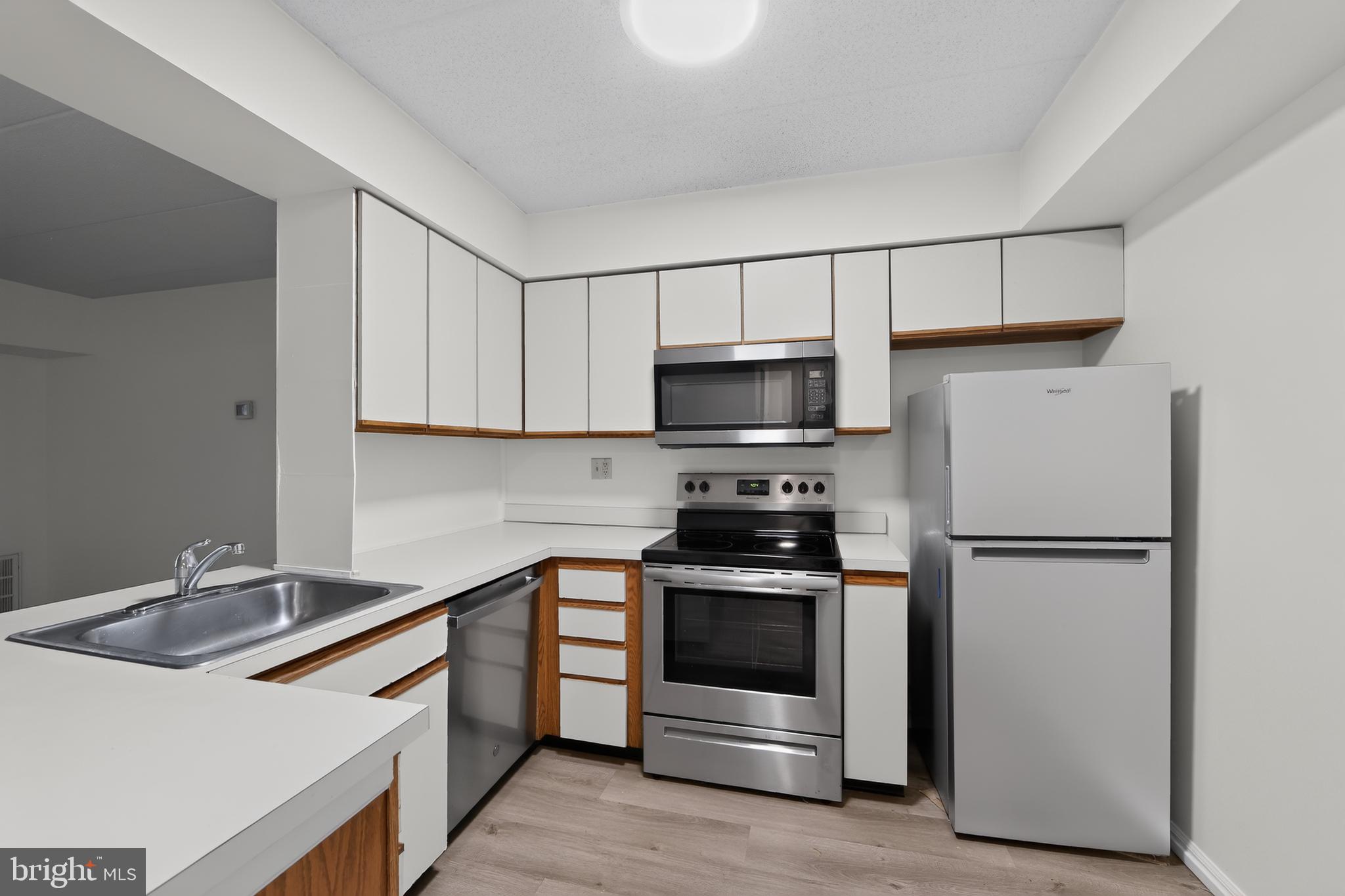 1311 Eagles Ridge Drive, Unit 11 Chesterbrook, PA 19087 - Photo 11 of 24 Modern kitchen with sleek finishes.