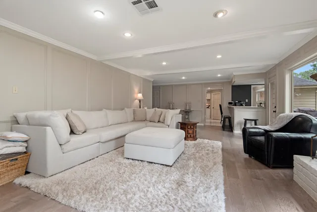 a living room with furniture and a couch