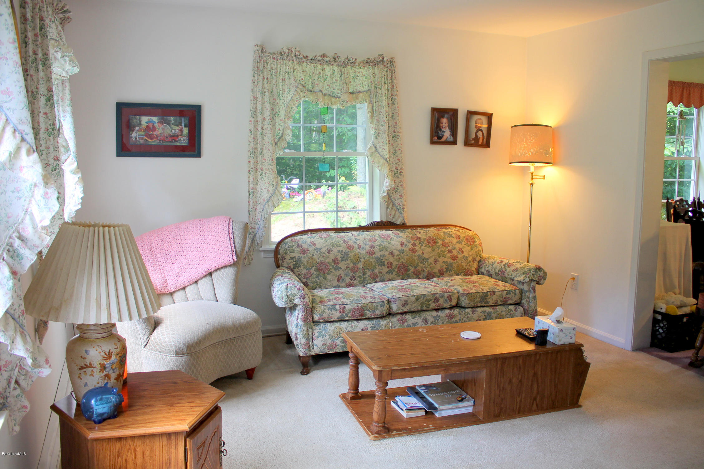 1006 West Center Road Otis, MA 01253 - Photo 4 of 22 a living room with furniture and a window