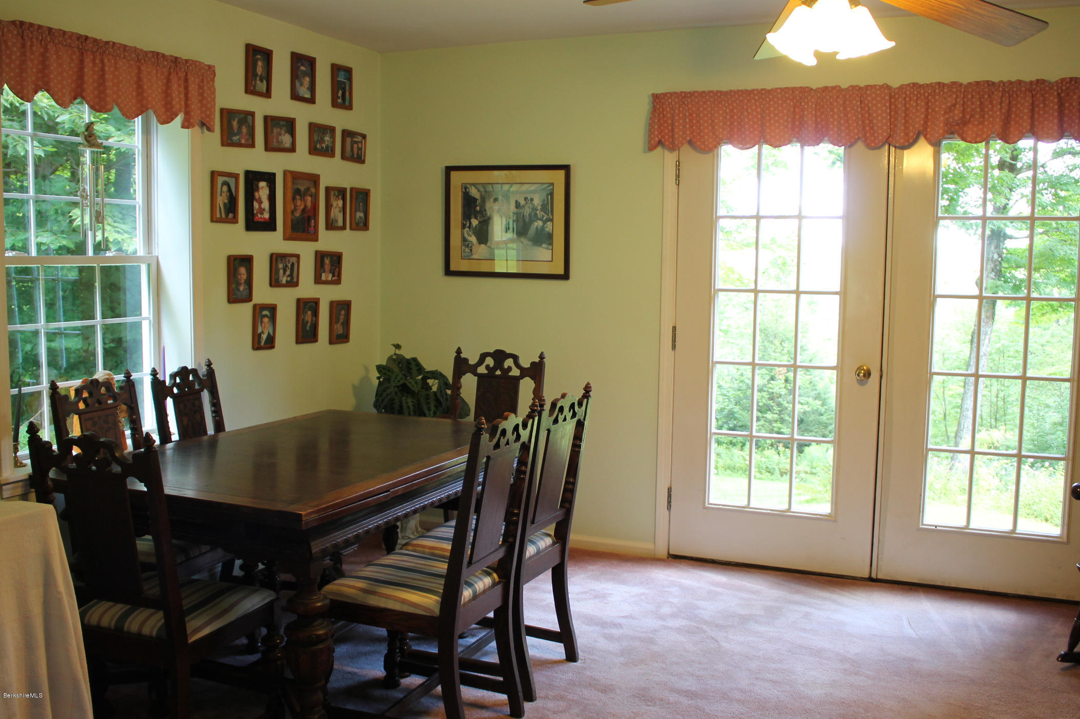 1006 West Center Road Otis, MA 01253 - Photo 7 of 22 a view of a dining room with furniture window and wooden floor