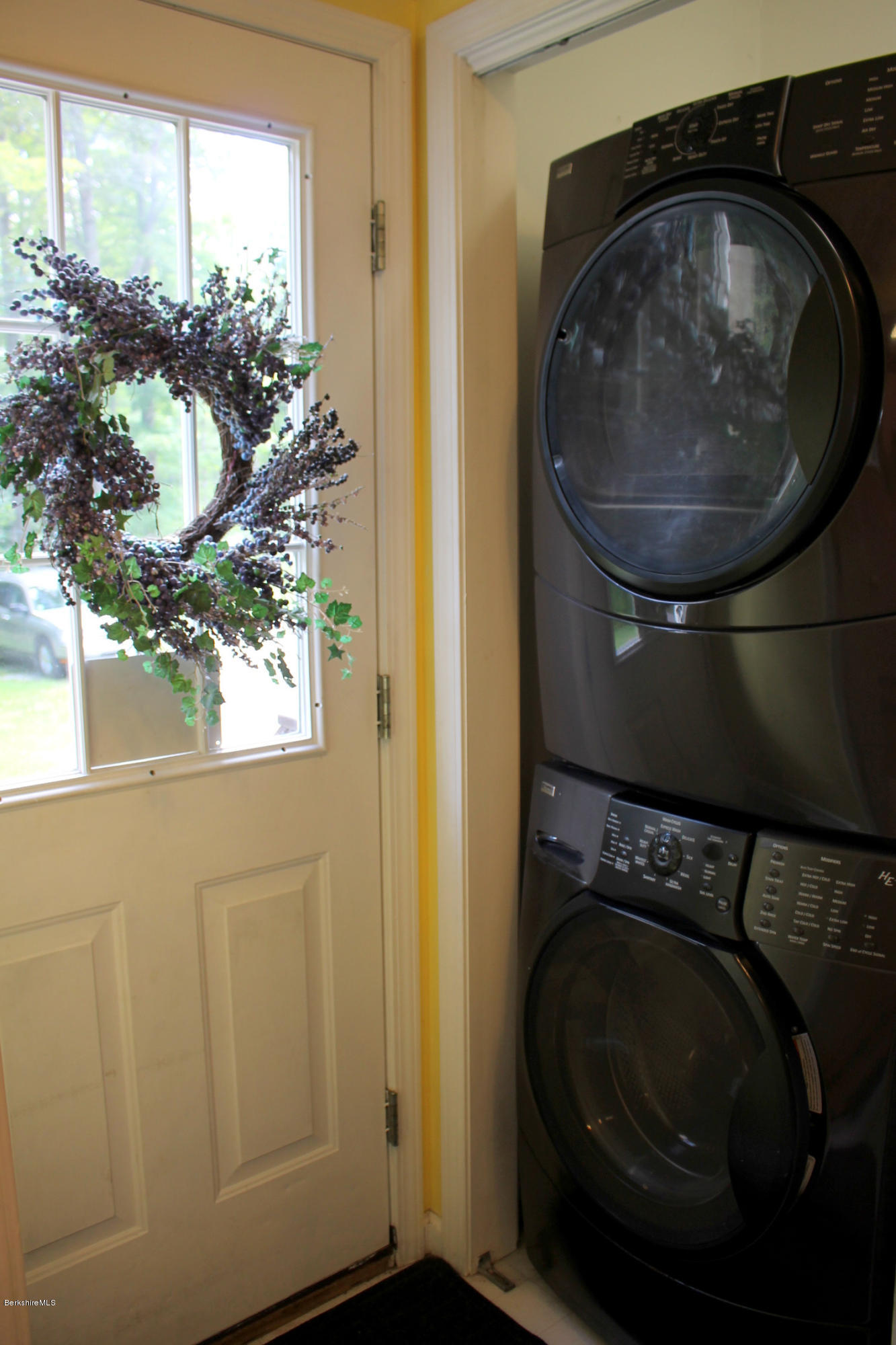 1006 West Center Road Otis, MA 01253 - Photo 8 of 22 a utility room with wooden floor and window
