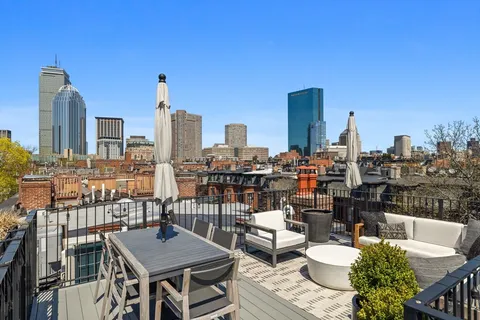 a view of a city with tall buildings