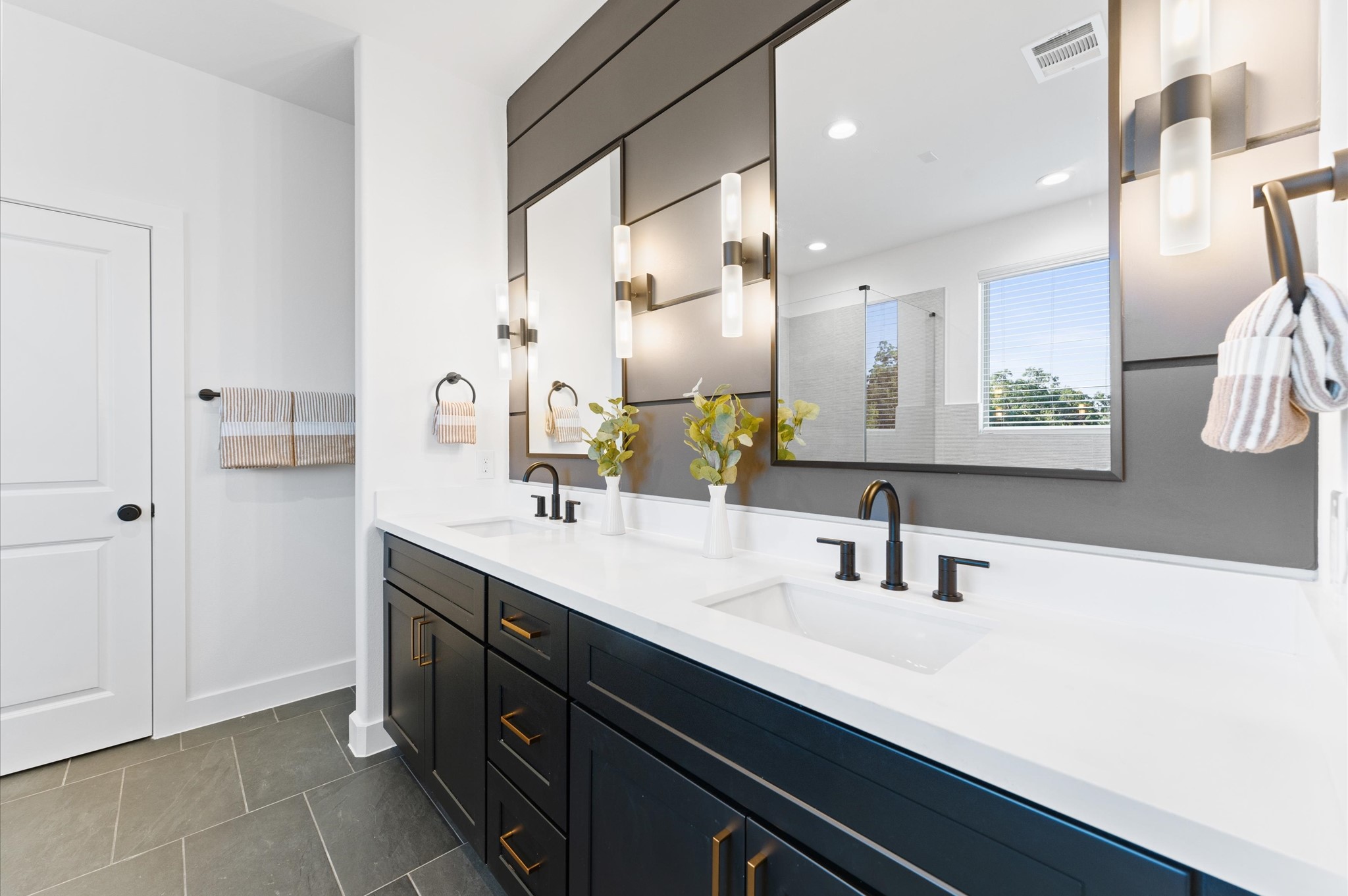 7805 Amelia Road, Unit B Houston, TX 77055 - Photo 30 of 35 Primary bath. Photos are from a previous NJA Homes development. Floor plan, finishes & specifications may vary.