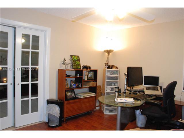 3339 West Park Road Hollywood, FL 33021 - Photo 11 of 15 a view of a workspace with furniture