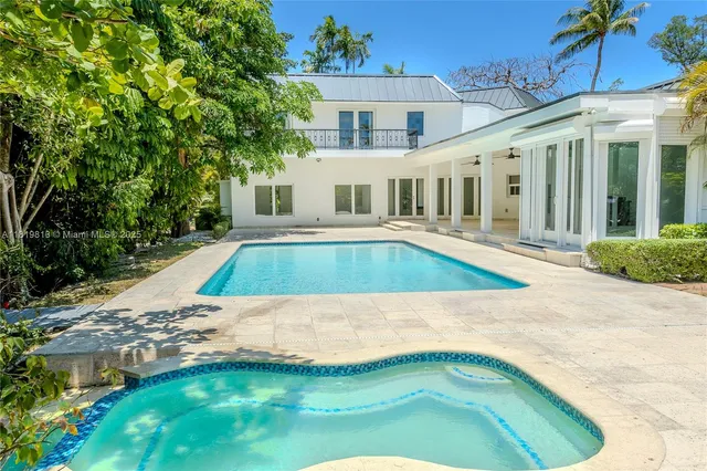 a view of a house with a swimming pool