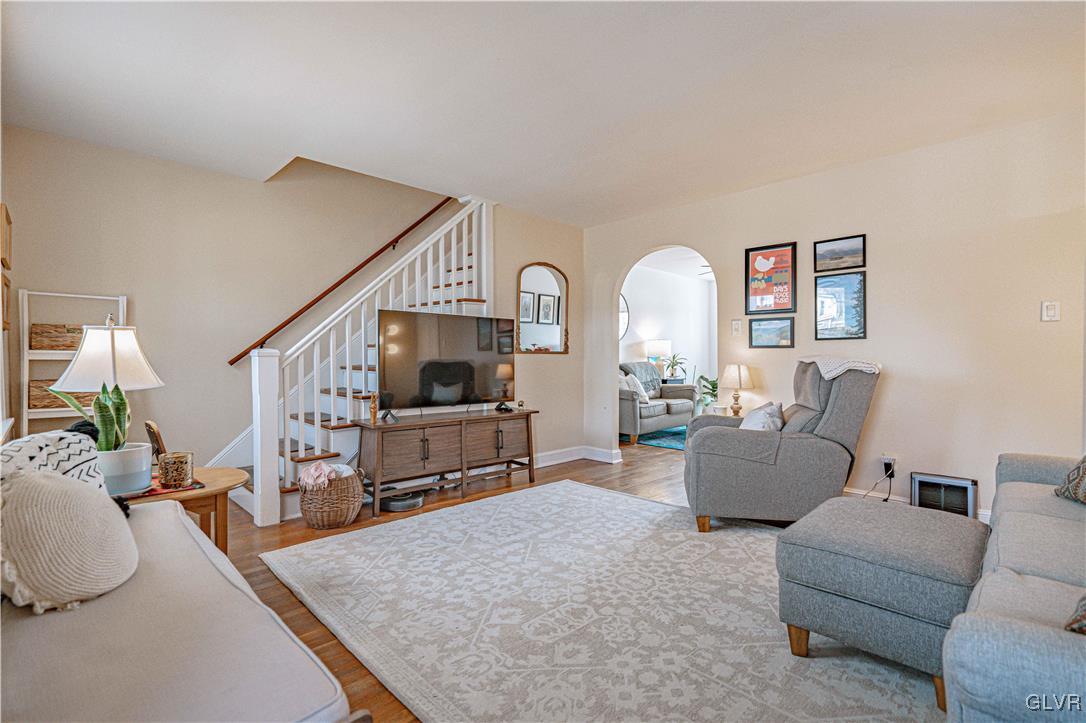 711 Spring Street Bethlehem, PA 18018 - Photo 4 of 26 a living room with furniture and a flat screen tv