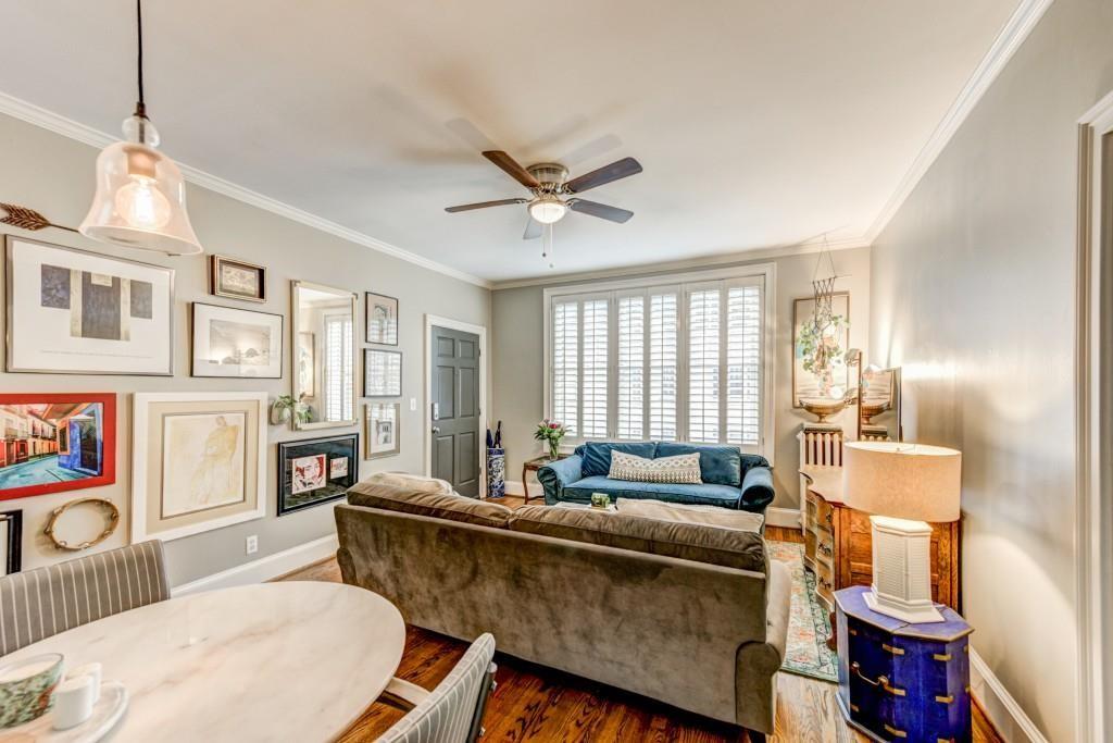 28 Collier Road Northwest, Unit 11 Atlanta, GA 30309 - Photo 3 of 23 a living room with furniture and a window