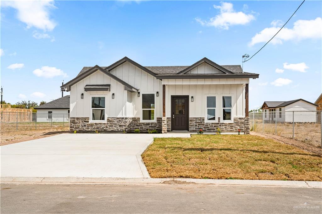 2317 Tuscany Road Weslaco, TX 78596 - Photo 1 of 13 a view of a house with a swimming pool and a yard