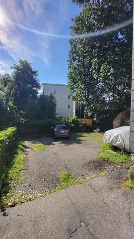 a view of backyard with green space