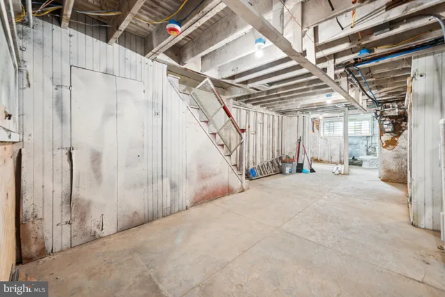 a view of a room with wooden walls