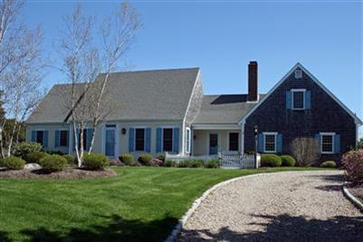 55 Ruggles Road Orleans, MA 02653 - Photo 1 of 30 a front view of house with yard and green space