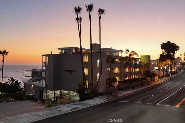 a view of a street with tall buildings