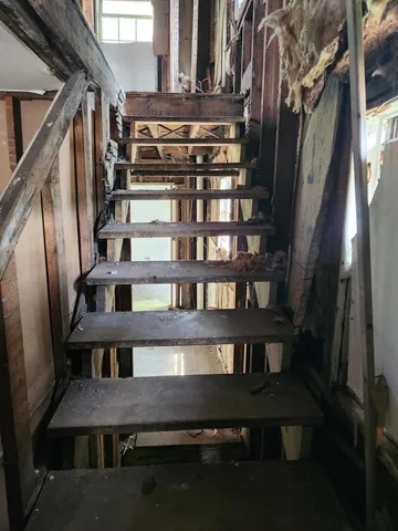 a view of balcony and wooden floor