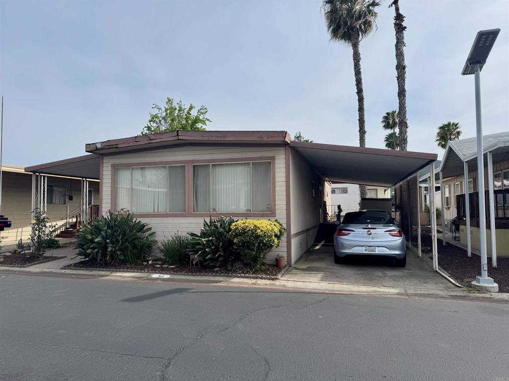 a car parked in front of a house