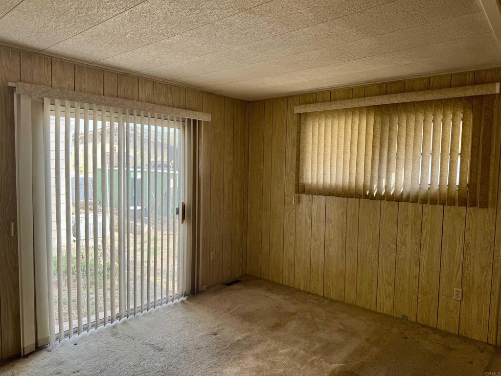8301 Mission Gorge Road, Unit 54 Santee, CA 92071 - Photo 16 of 24 a view of an empty room with a window