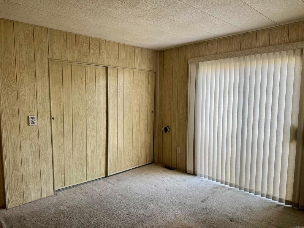 8301 Mission Gorge Road, Unit 54 Santee, CA 92071 - Photo 17 of 24 a view of a room with a wooden walls