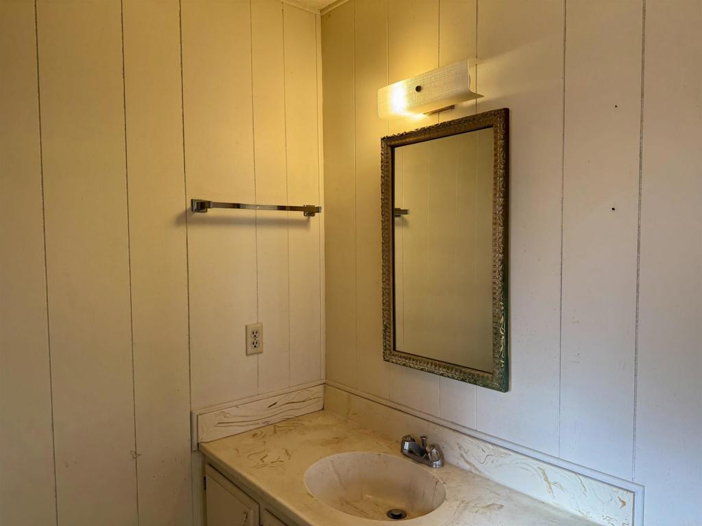 8301 Mission Gorge Road, Unit 54 Santee, CA 92071 - Photo 20 of 24 a bathroom with a sink and mirror