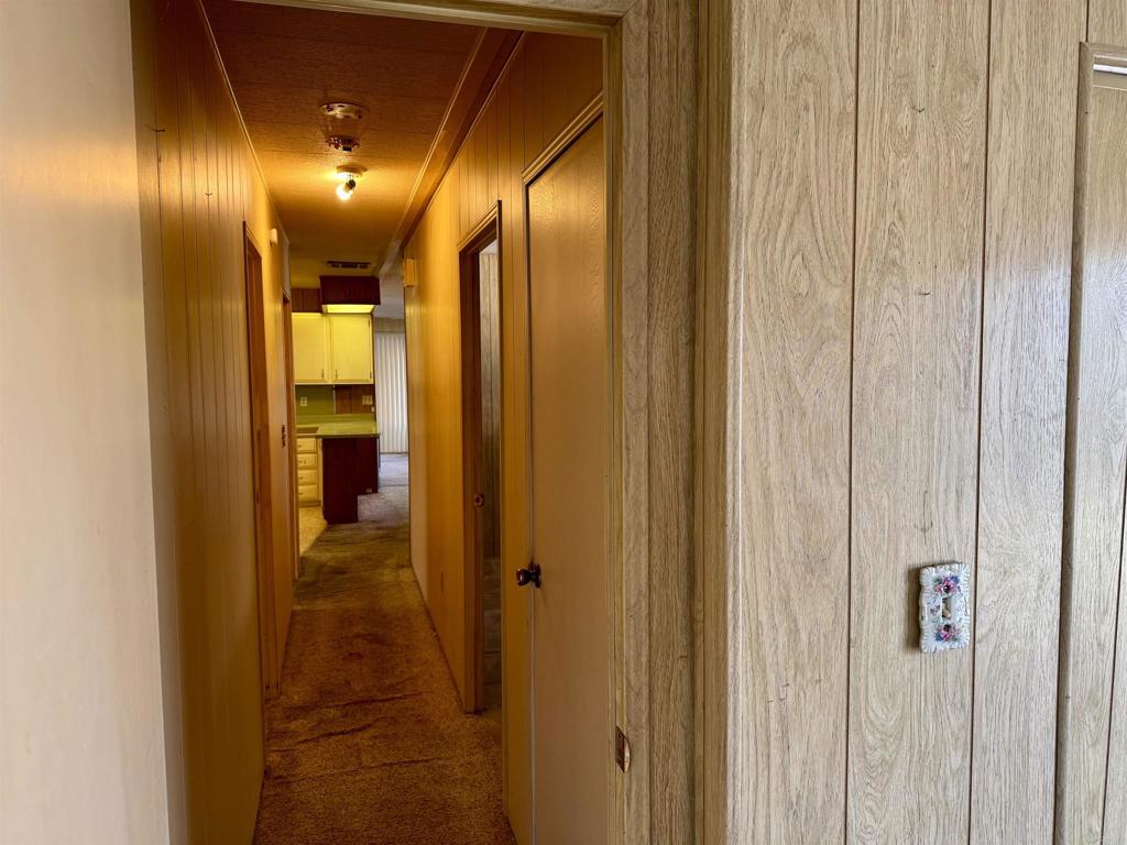 8301 Mission Gorge Road, Unit 54 Santee, CA 92071 - Photo 23 of 24 a bathroom with a mirror and a shower