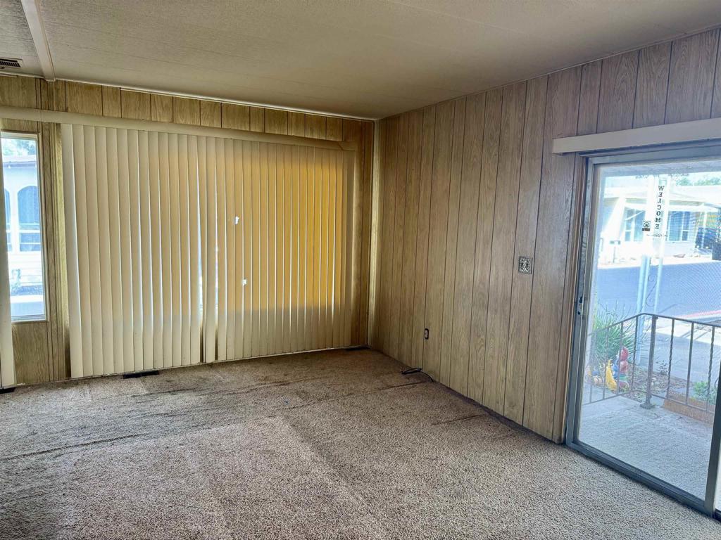 8301 Mission Gorge Road, Unit 54 Santee, CA 92071 - Photo 6 of 24 an empty room with windows