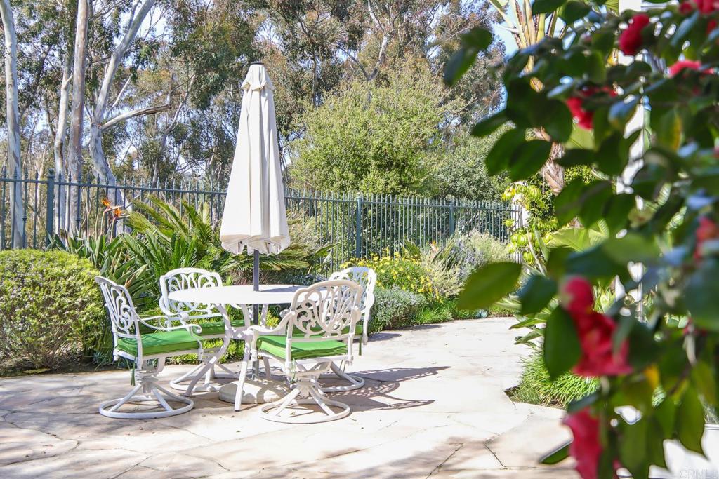 7163 Tern Place Carlsbad, CA 92011 - Photo 45 of 48 a chair and table with chairs in patio