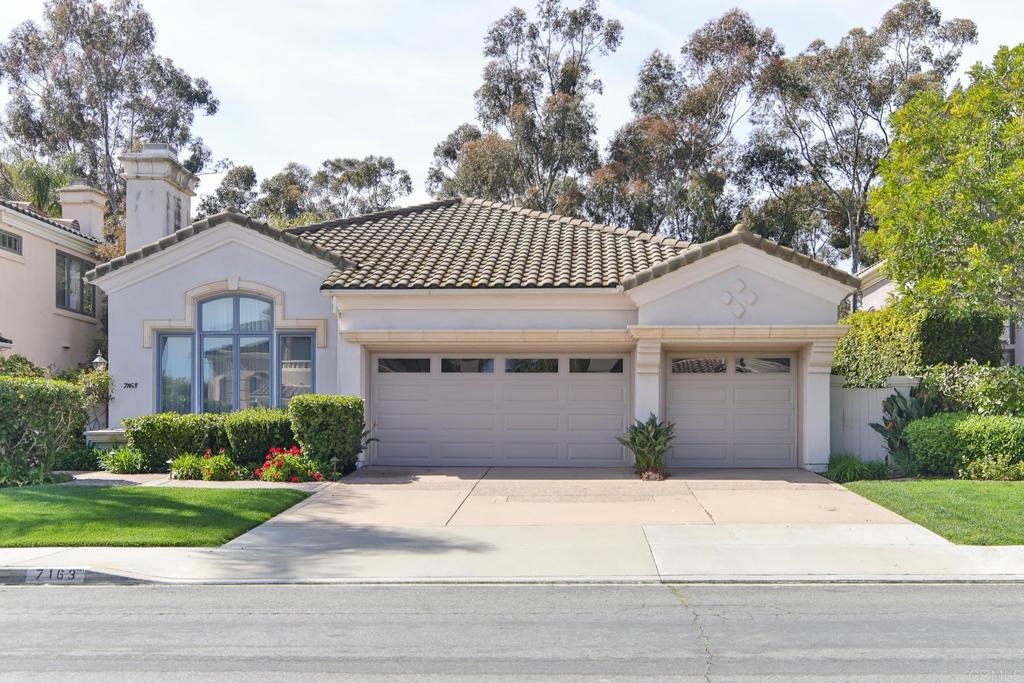 7163 Tern Place Carlsbad, CA 92011 - Photo 6 of 48 a front view of a house with garden