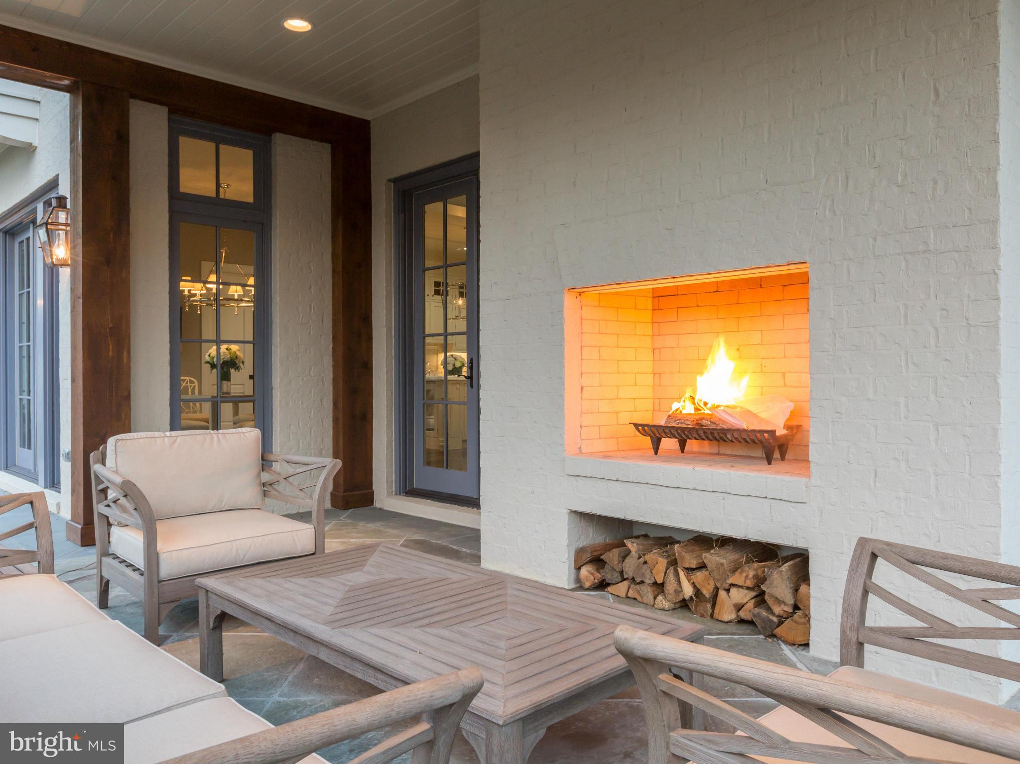 821 Turkey Run Road McLean, VA 22101 - Photo 28 of 30 a living room with furniture and a flat screen tv