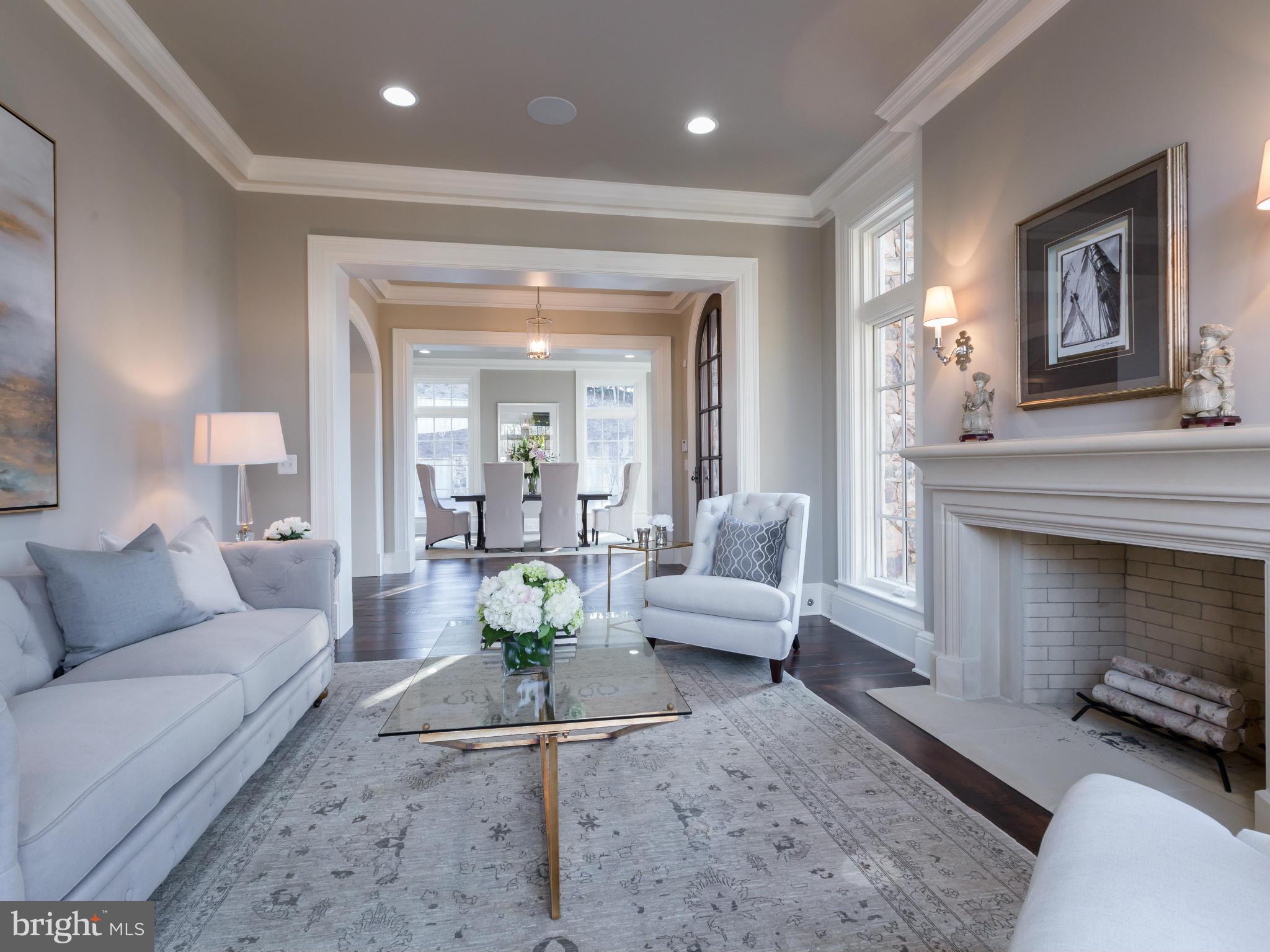 821 Turkey Run Road McLean, VA 22101 - Photo 7 of 30 a living room with furniture and a fireplace