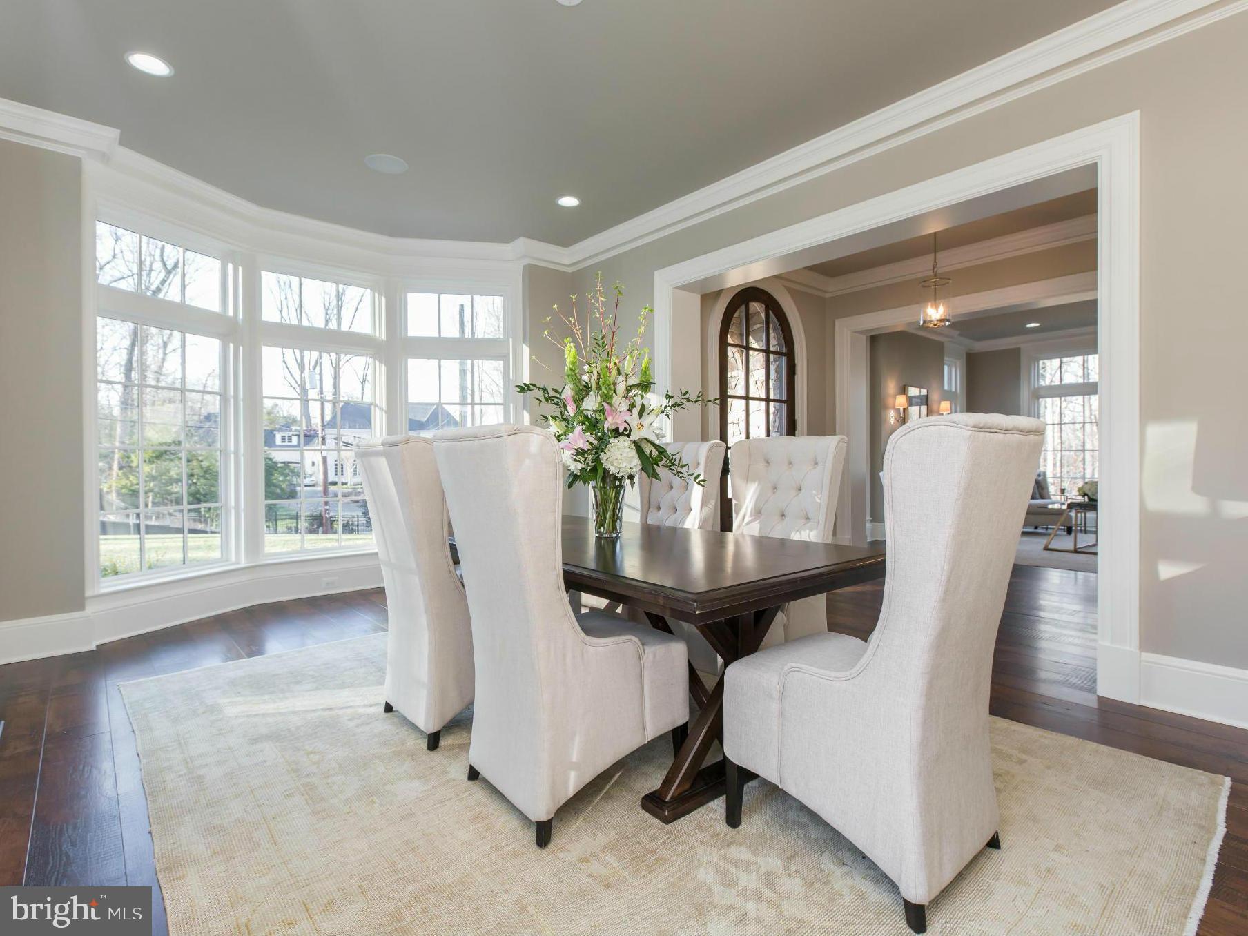 821 Turkey Run Road McLean, VA 22101 - Photo 8 of 30 a view of a dining room with furniture and wooden floor