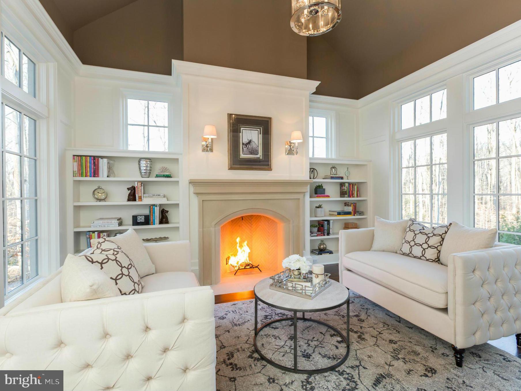 821 Turkey Run Road McLean, VA 22101 - Photo 9 of 30 a living room with furniture and a fireplace