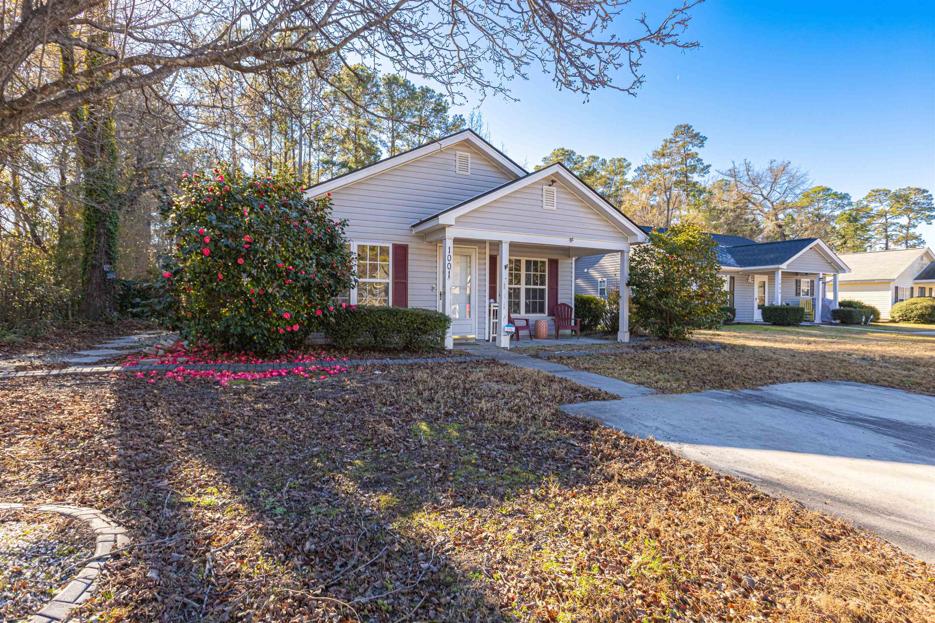 1001 Mistletoe Court Myrtle Beach, SC 29579 - Photo 1 of 28 View of front of property featuring a porch