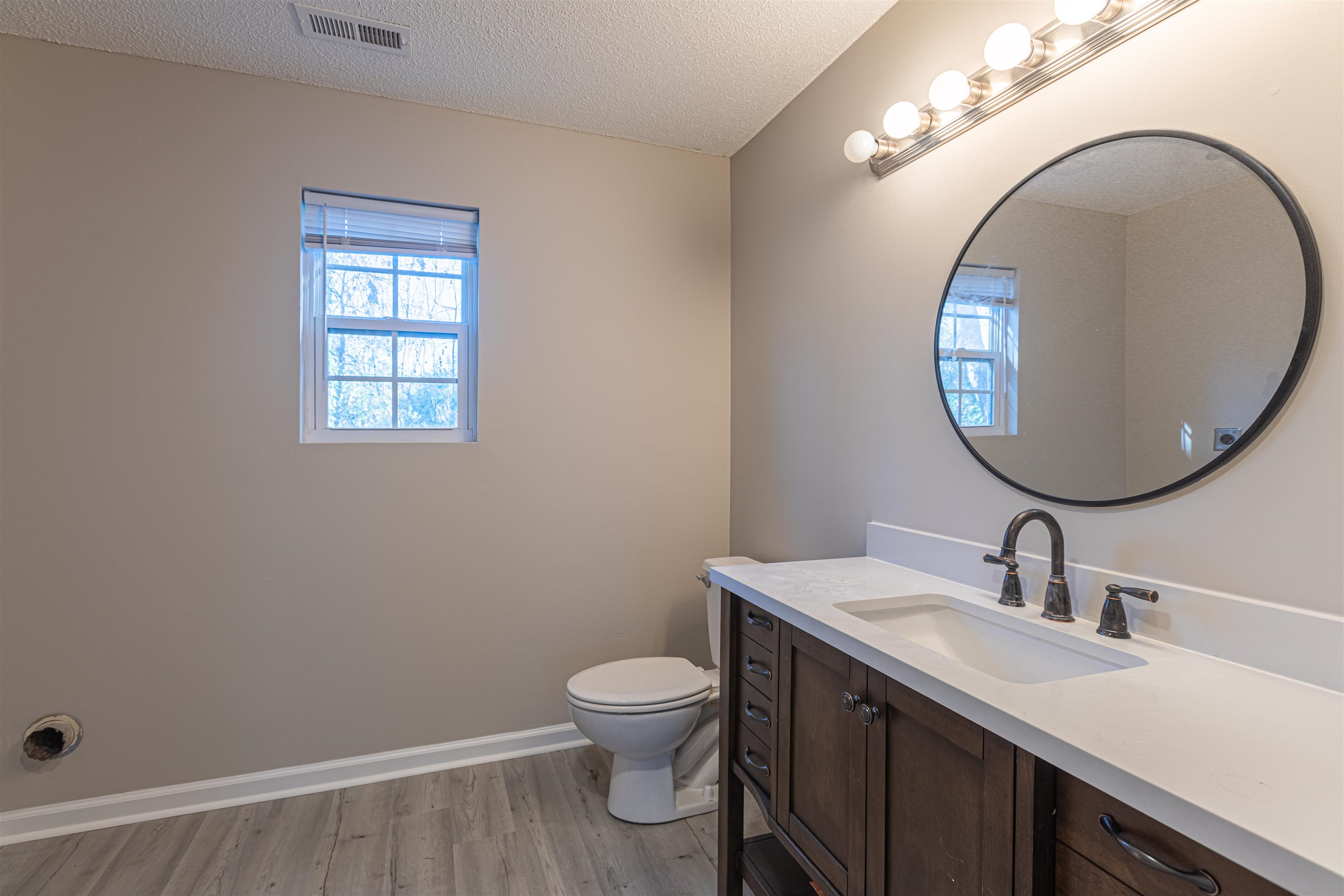 1001 Mistletoe Court Myrtle Beach, SC 29579 - Photo 17 of 28 Bathroom featuring vanity and baseboards