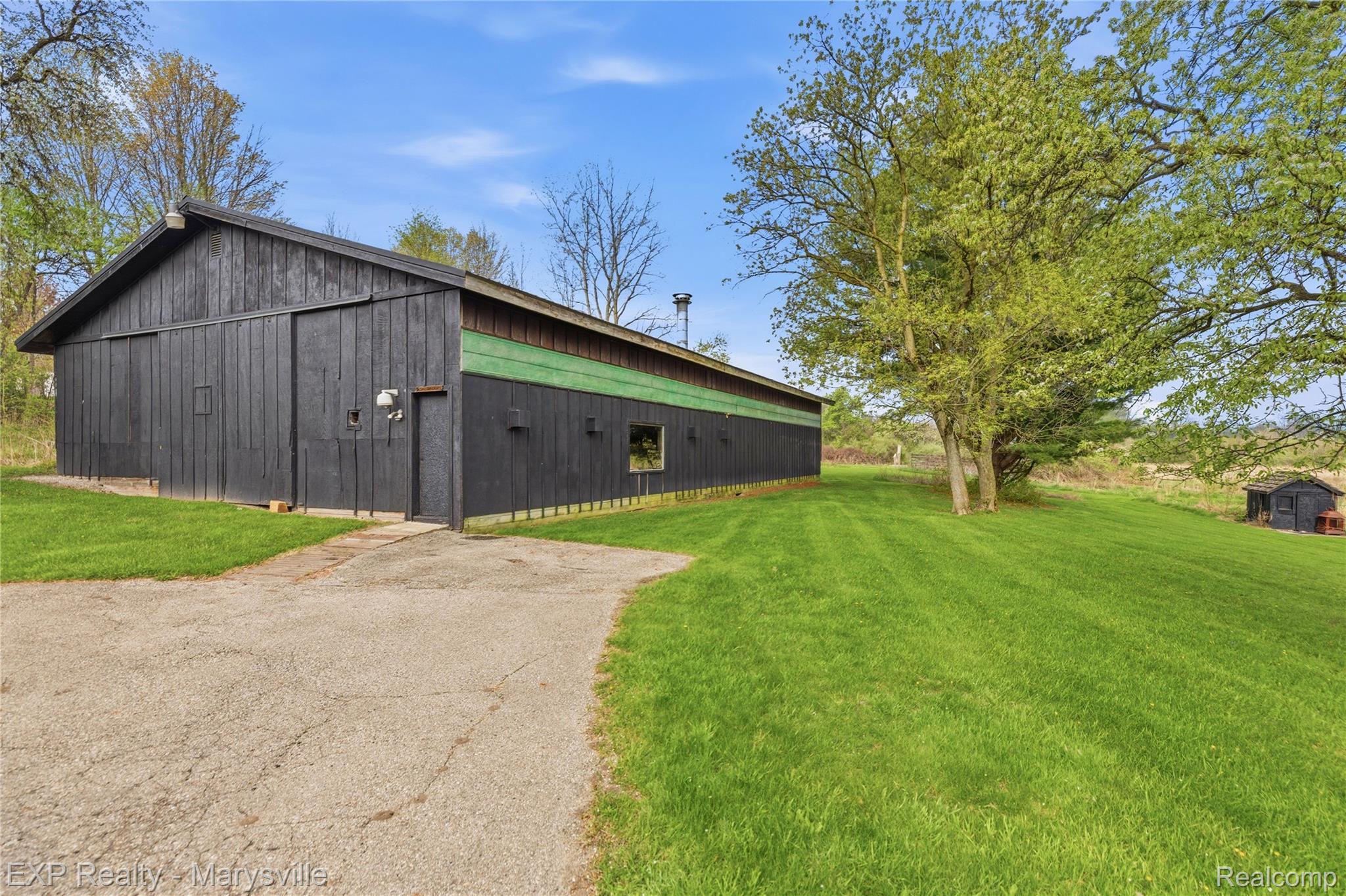 3345 Beach Road Port Huron, MI 48060 - Photo 47 of 89 View of pole building with a yard