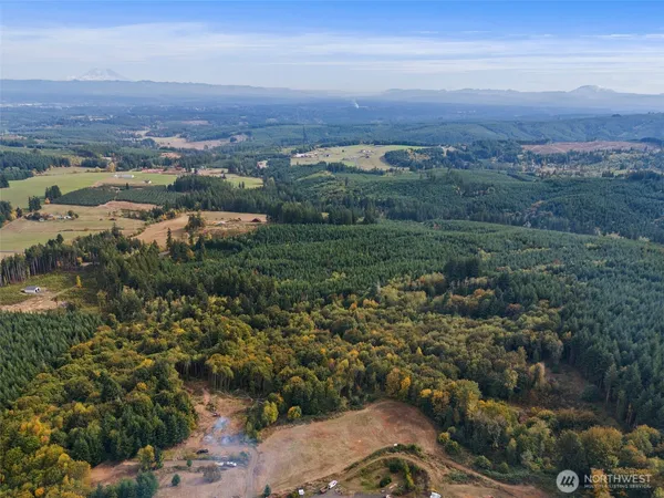 aerial view of a city and mountain view in back