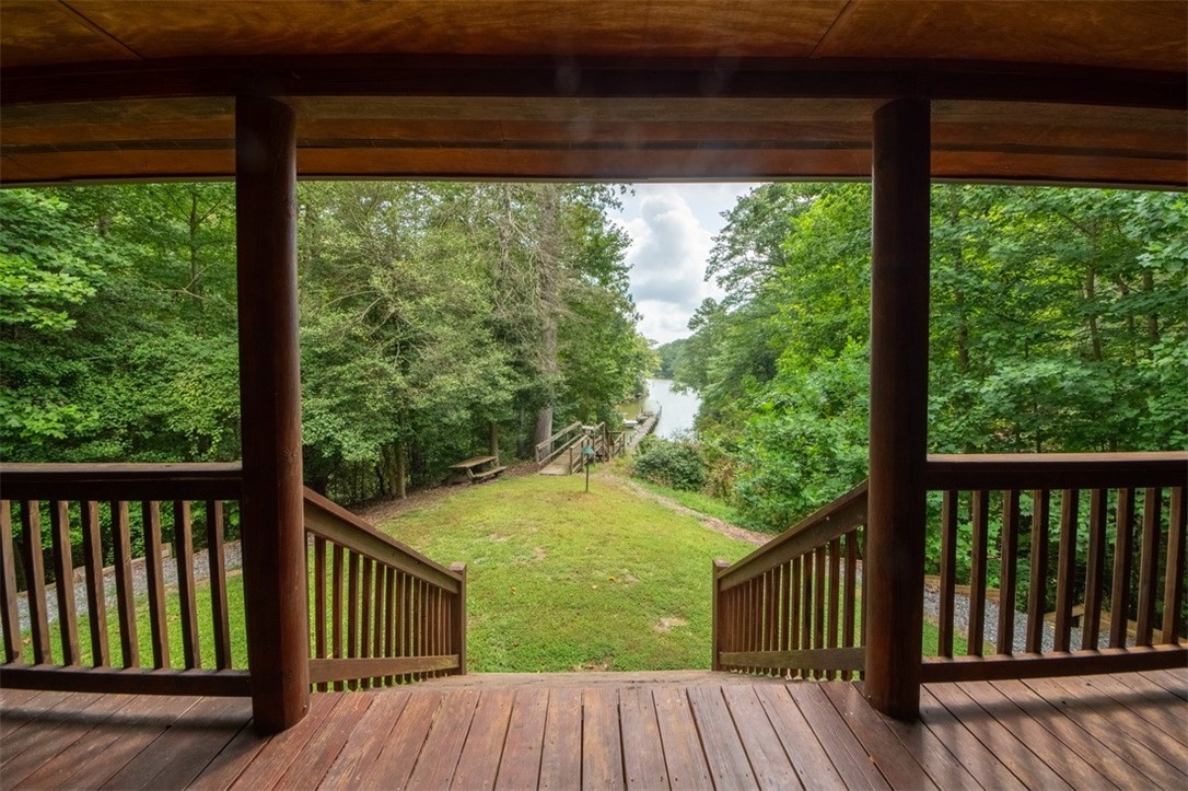 846 Twiggs Ferry Road Hartfield, VA 23071 - Photo 21 of 28 Deck with a lawn