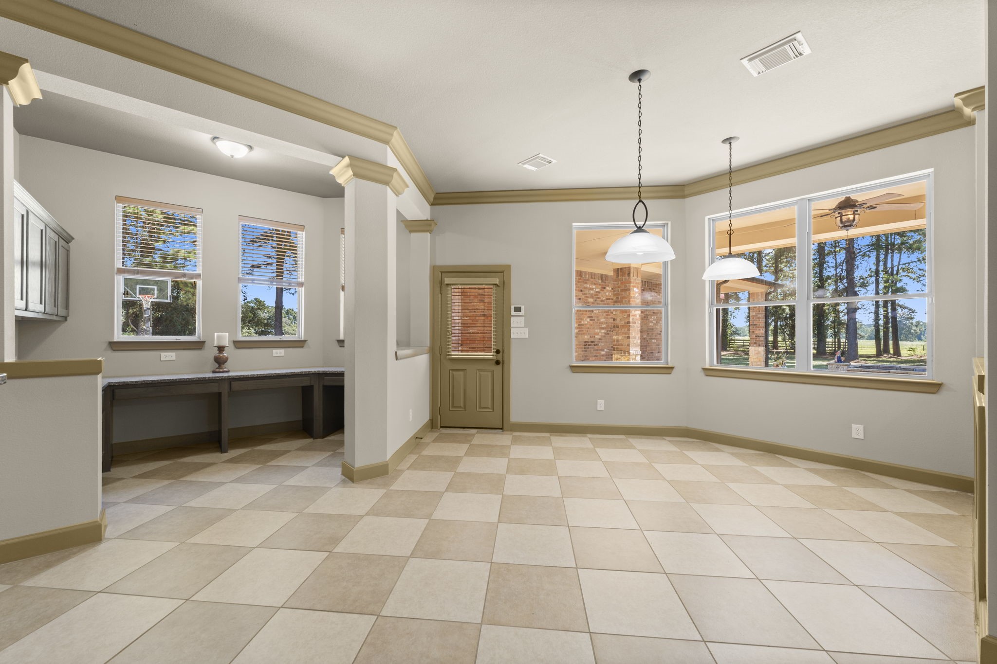 1534 Virgie Community Road Magnolia, TX 77354 - Photo 20 of 50 To the left you will see the second office space of this amazing home. Working from home has never been so easy and with so much space! What a great room for the kids to do homework as well!