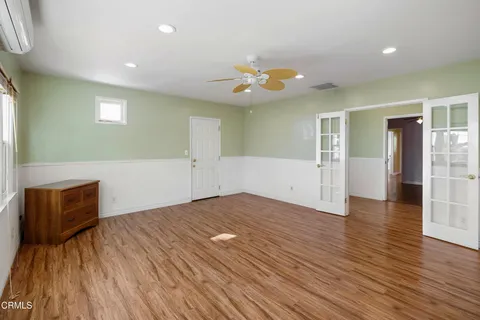a view of a house with outdoor space and sitting area
