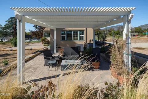 a view of a town with mountains in the background