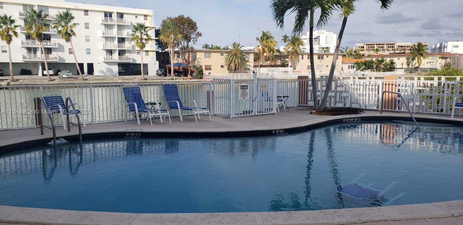 Normandy Isle Miami Beach, FL 33141 - Photo 12 of 12 a view of residential houses with outdoor space and lake view