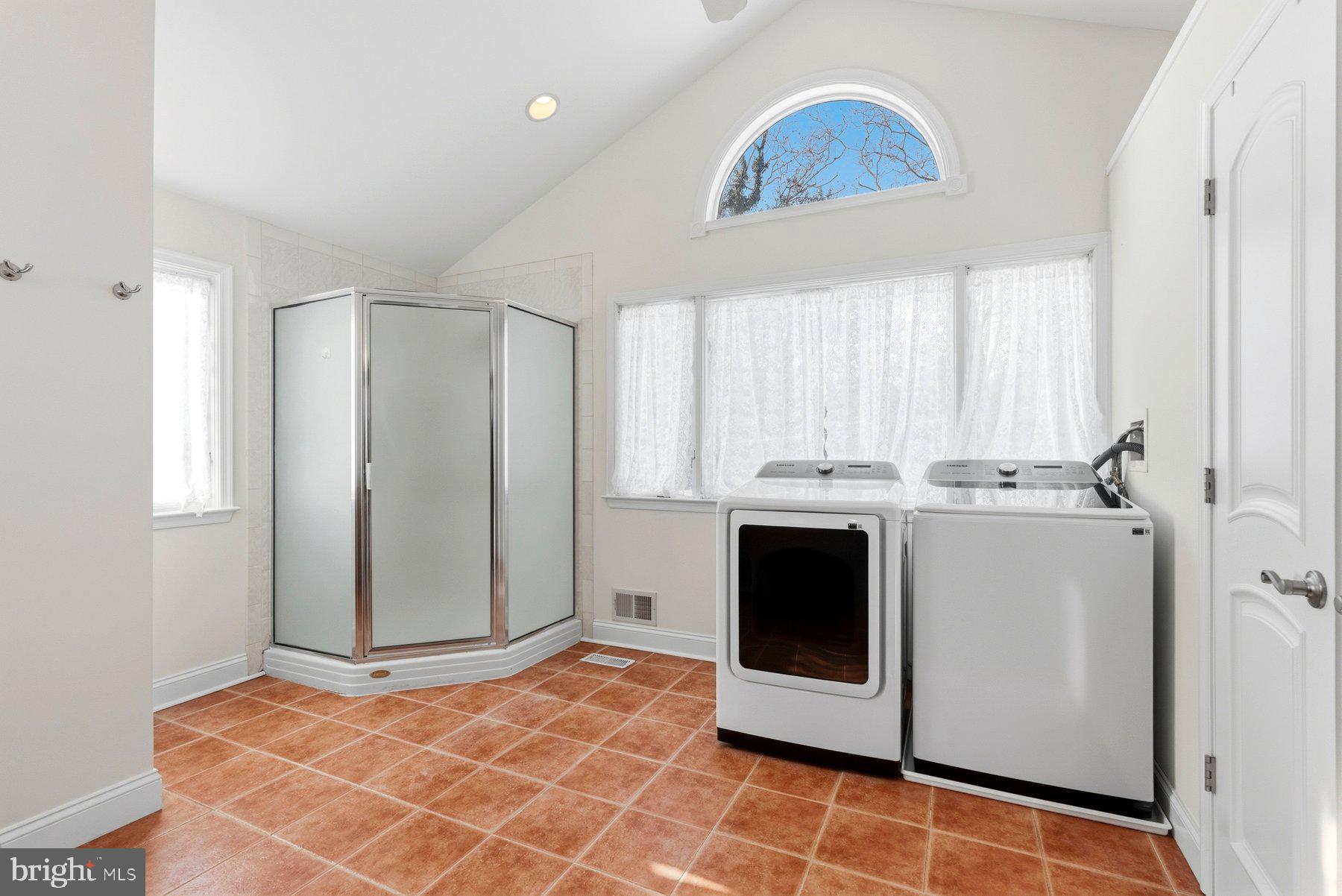 109 Ridgefield Road Lutherville-Timonium, MD 21093 - Photo 14 of 31 a view of kitchen with washer and dryer