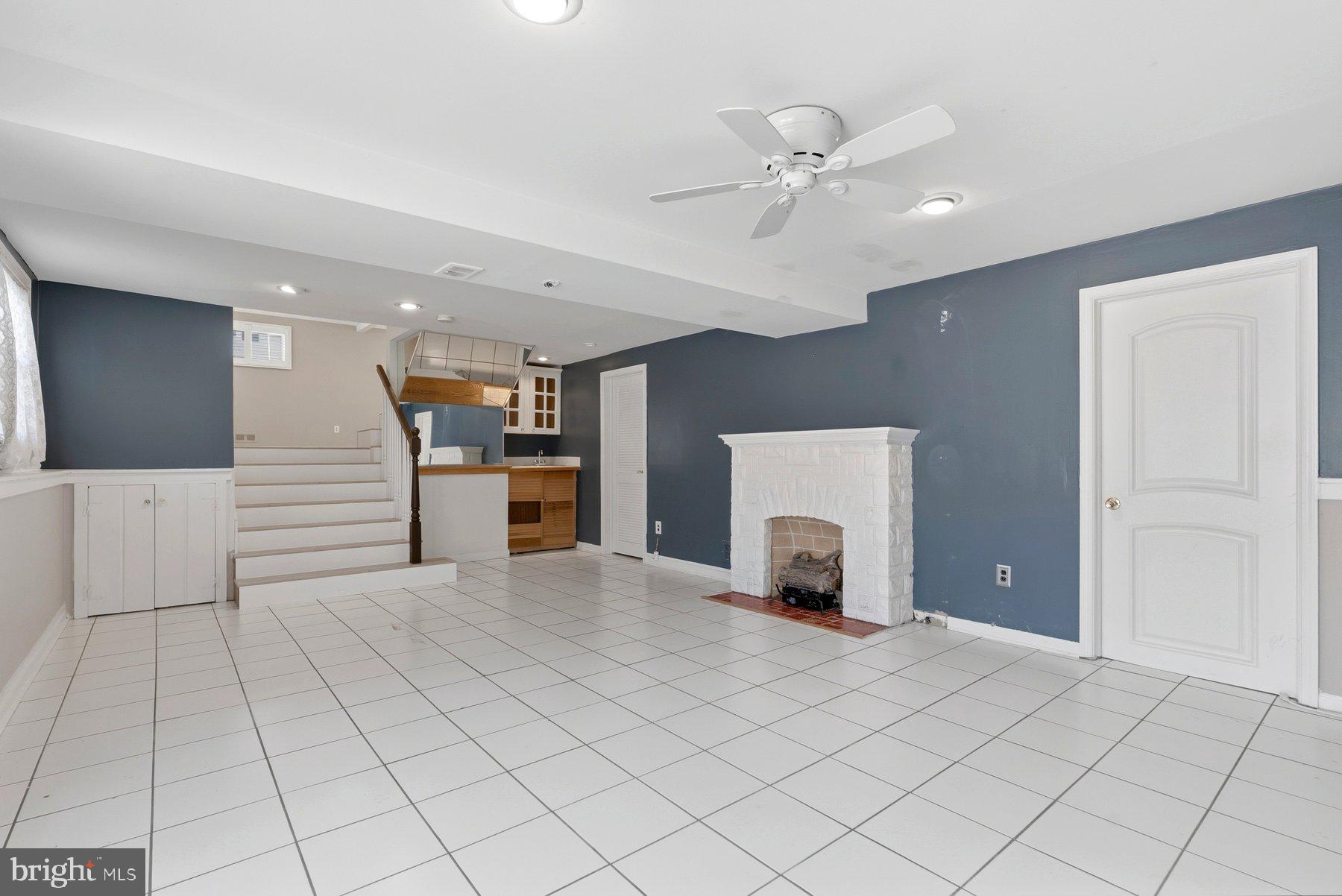 109 Ridgefield Road Lutherville-Timonium, MD 21093 - Photo 27 of 31 a view of an empty room with a fireplace