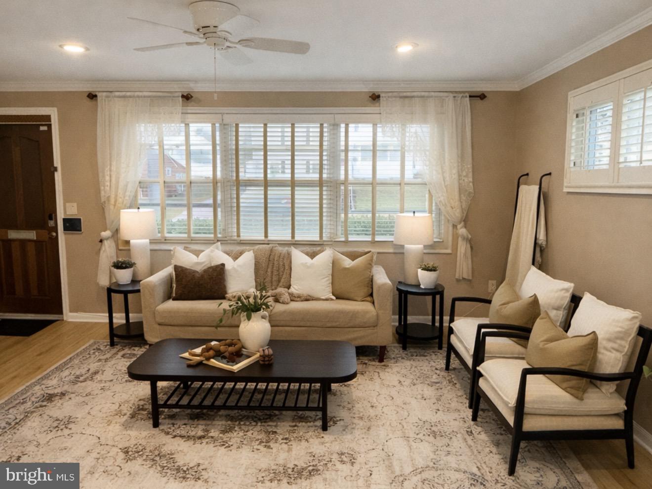 109 Ridgefield Road Lutherville-Timonium, MD 21093 - Photo 4 of 31 a living room with furniture and a large window