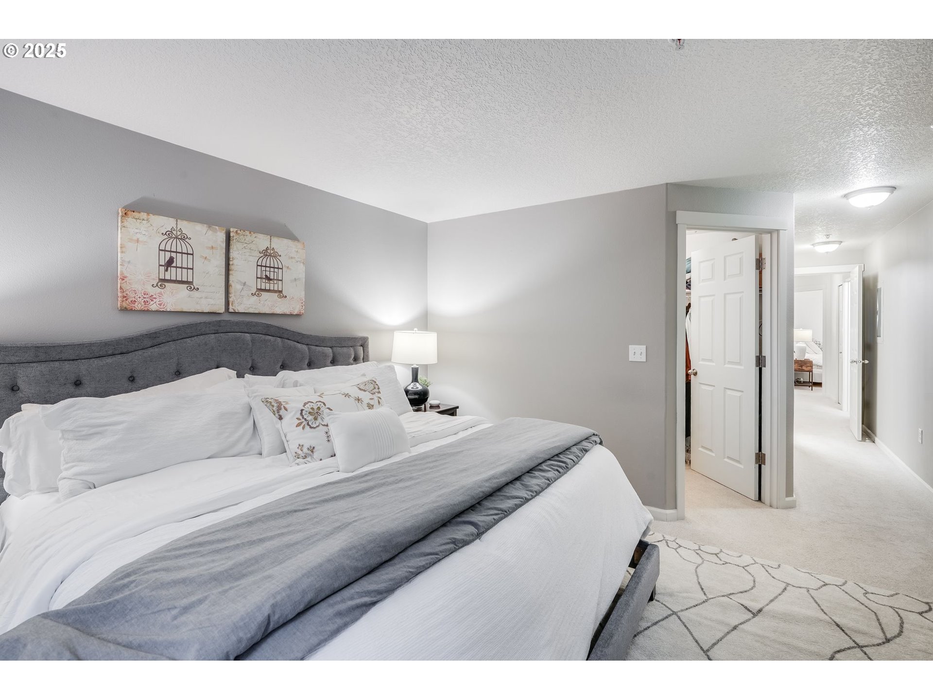 10797 Southwest Canterbury Lane, Unit 101 Portland, OR 97224 - Photo 15 of 28 Primary Bedroom