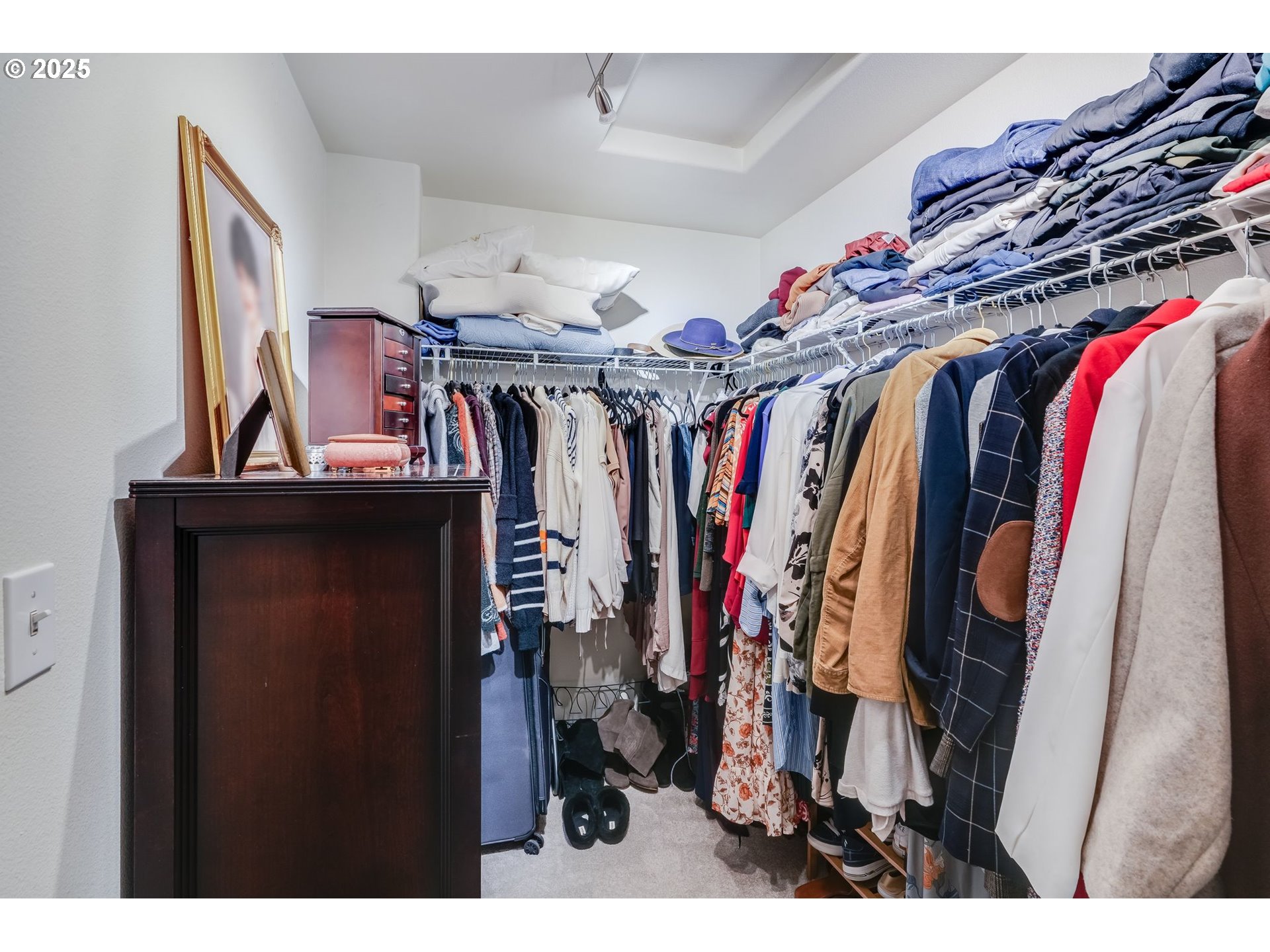 10797 Southwest Canterbury Lane, Unit 101 Portland, OR 97224 - Photo 18 of 28 Primary Bedroom