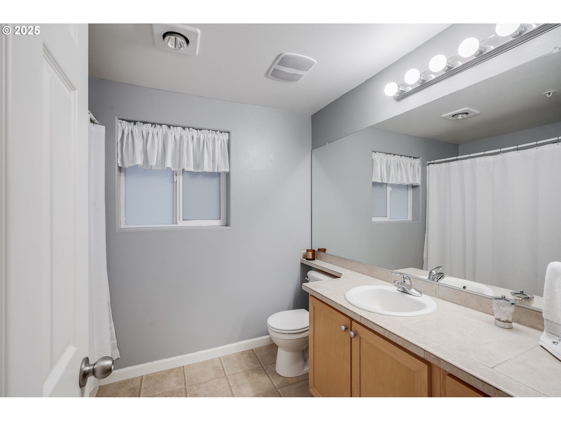 10797 Southwest Canterbury Lane, Unit 101 Portland, OR 97224 - Photo 24 of 28 Attached Bathroom #3