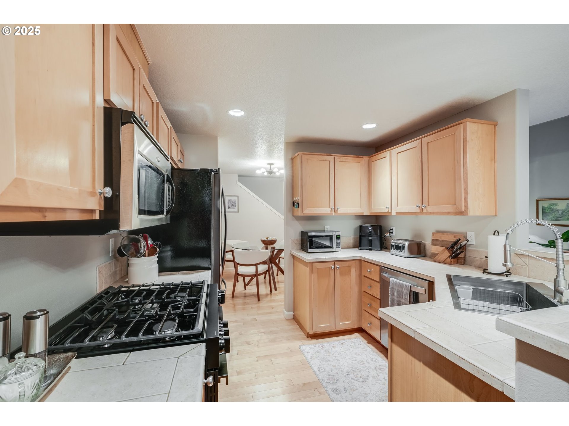 10797 Southwest Canterbury Lane, Unit 101 Portland, OR 97224 - Photo 8 of 28 Kitchen
