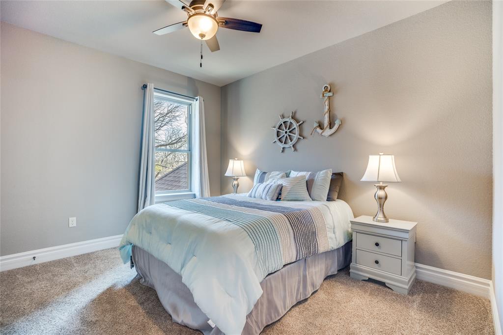 181 Ridgeline Drive Chico, TX 76431 - Photo 22 of 39 a bedroom with bed and window